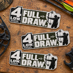 Three sizes of the compound bow metal emblem side by side