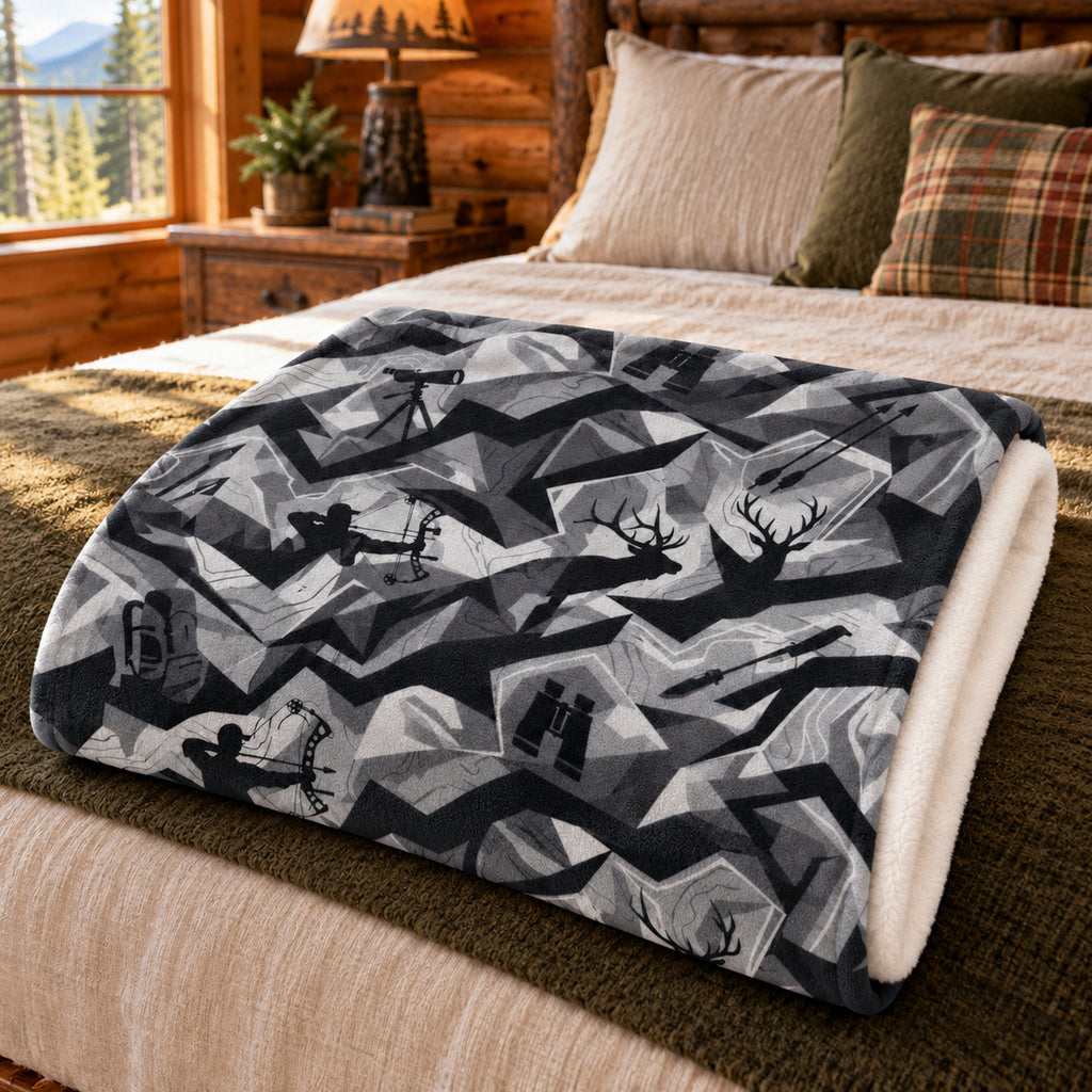 Shadow Ridge Glassing Fleece Blanket folded on a bed