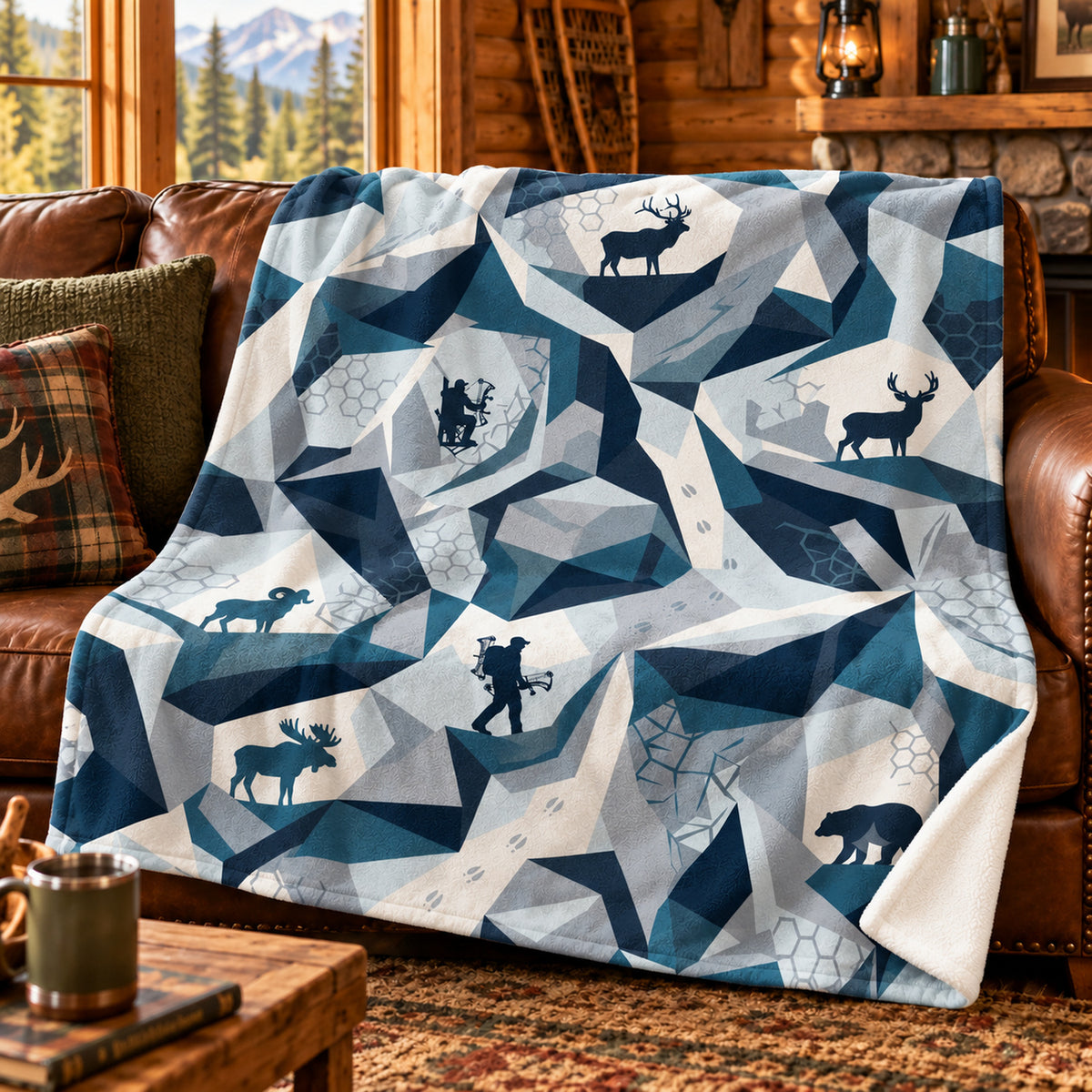 Alpine Facet Backcountry Fleece Blanket draped on a couch