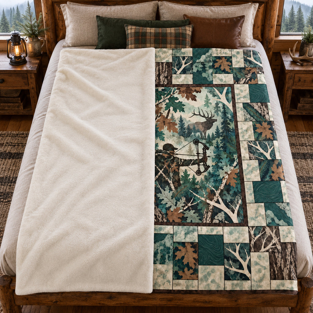 Teal Oak Patchwork Fleece Blanket folded on a bed showing the sherpa back