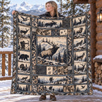 Hunter holding up the frost grey bull elk fleece blanket