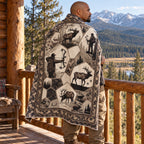 Blanket draped over the shoulders on a cabin porch