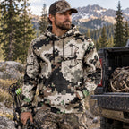 Bowhunting Pixel Grid Draw Field Pullover Hoodie worn outdoors