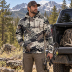 Bowhunting Hex Pixel Rig Field Pullover Hoodie worn outdoors