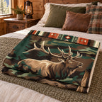 Bull Elk Camp Stripe Fleece Blanket folded on a bed