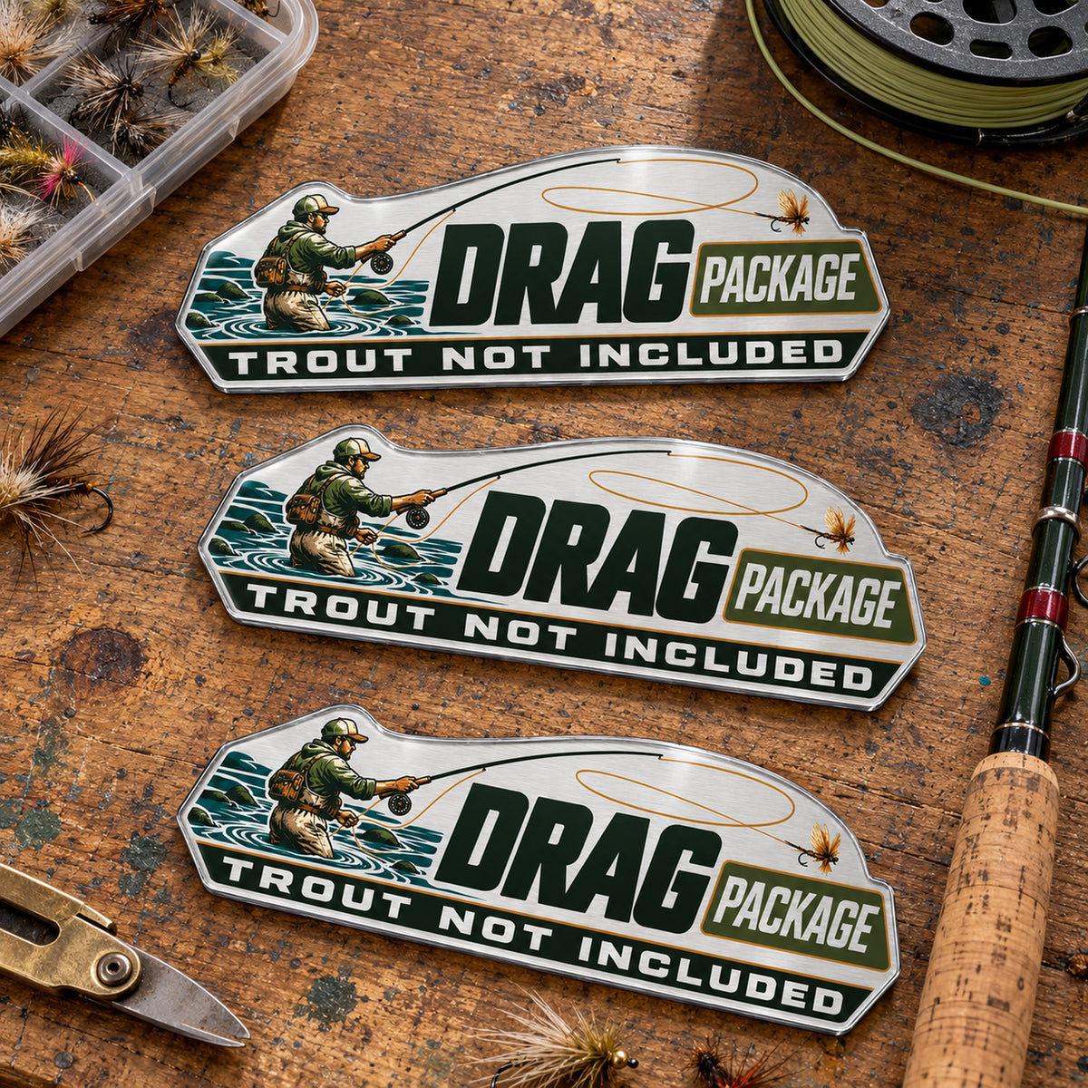 Three sizes of the fly fishing metal emblem side by side