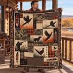 Hunter holding up the plaid patch feather pheasant fleece blanket