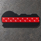 Back of the emblem: black ABS backing plate with pre-applied 3M adhesive