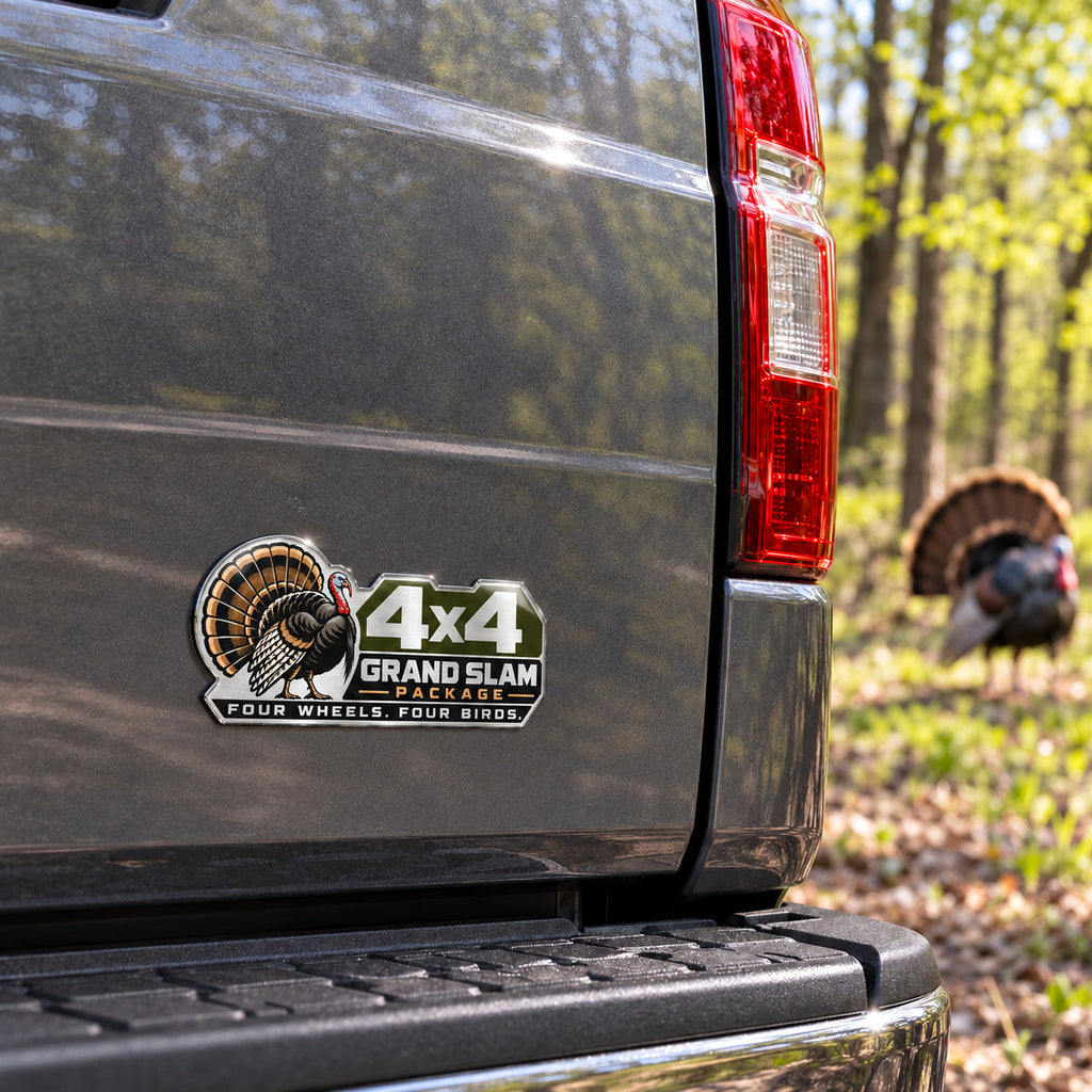 4x4 Grand Slam turkey emblem on a pickup truck tailgate, angle view