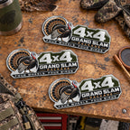 Three sizes of the turkey metal emblem side by side