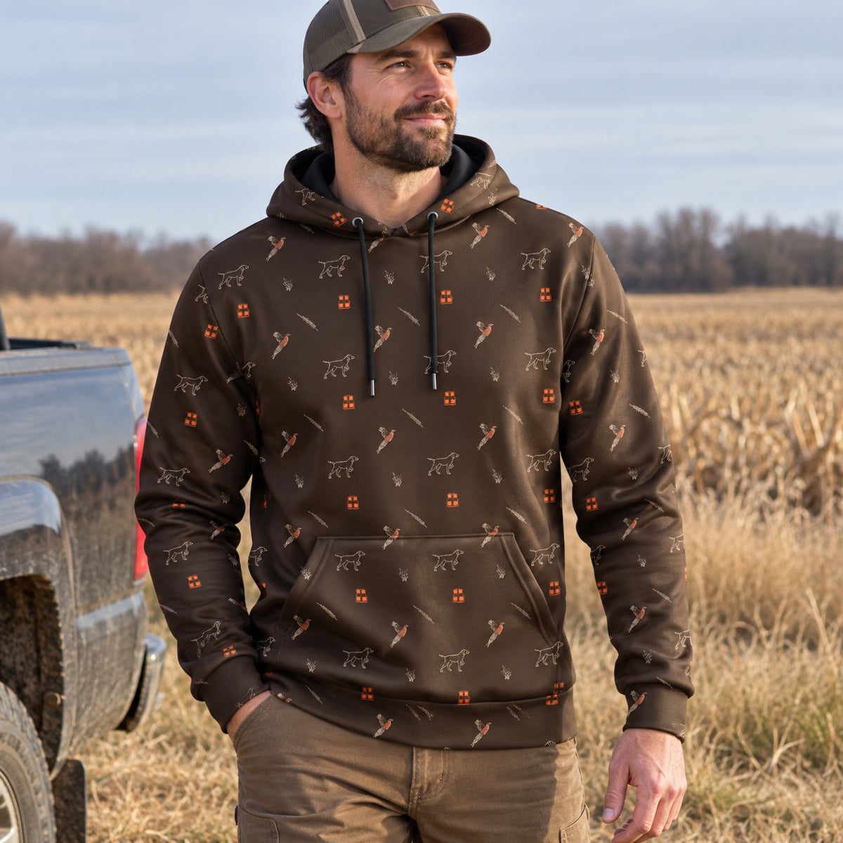 Upland Dog And Bird Icon Field Pullover Hoodie worn outdoors