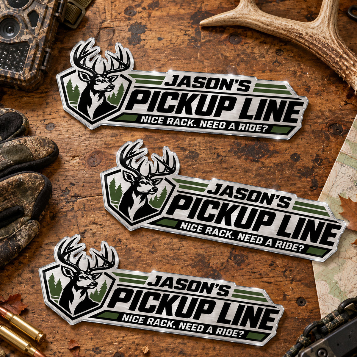 Three Pickup Line emblems on a hunting workbench